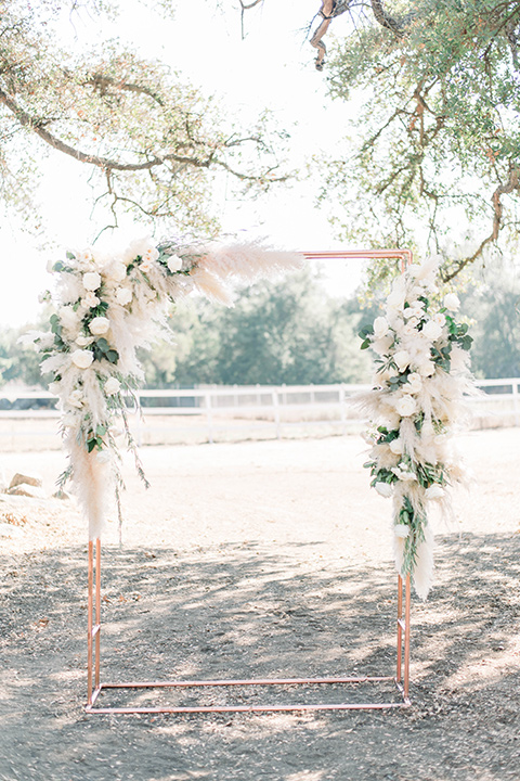  ceremony arch made of copper and florals 