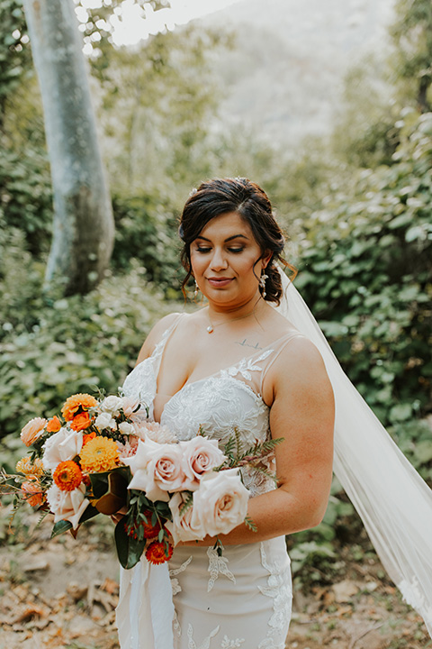  dreamy fall wedding bride in a long lace gown 