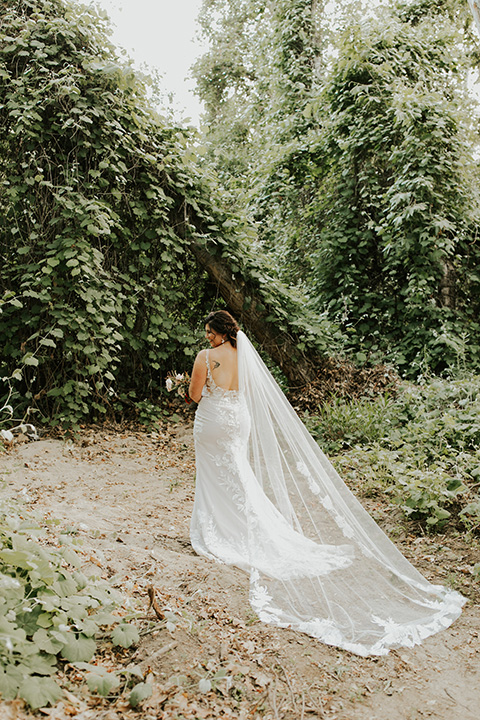  dreamy fall wedding bride in a long lace gown 