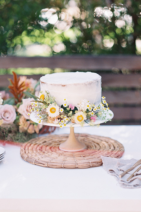  stunning chic pink and yellow wedding very french inspired, with a simple cake with wildflowers on it  
