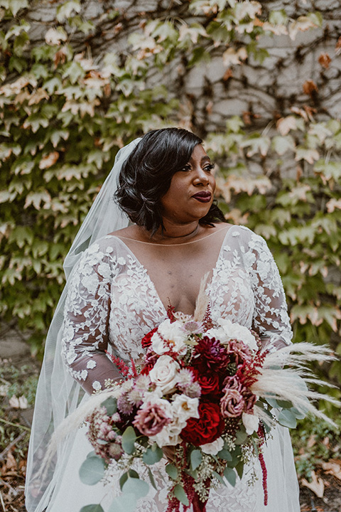  Letitia and Zach’s romantic vineyard burgundy + rose wedding – bride in her lace gown with long sleeves 