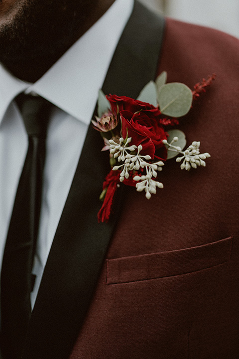  Letitia and Zach’s romantic vineyard burgundy + rose wedding – bride in her lace gown with long sleeves and the groom in a burgundy shawl lapel tuxedo