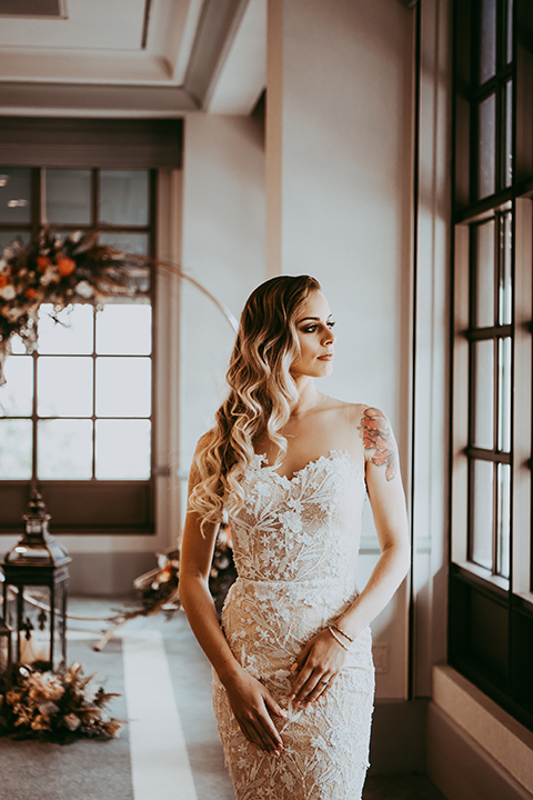  bride in a strapless gown with lace 