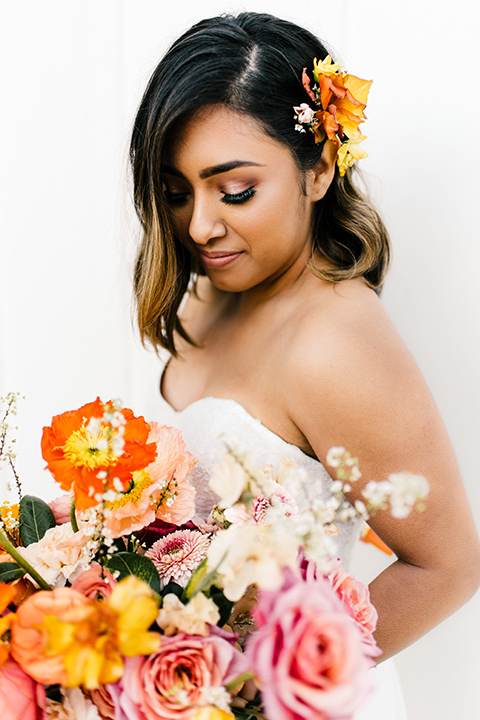  bride in a white strapless gown 