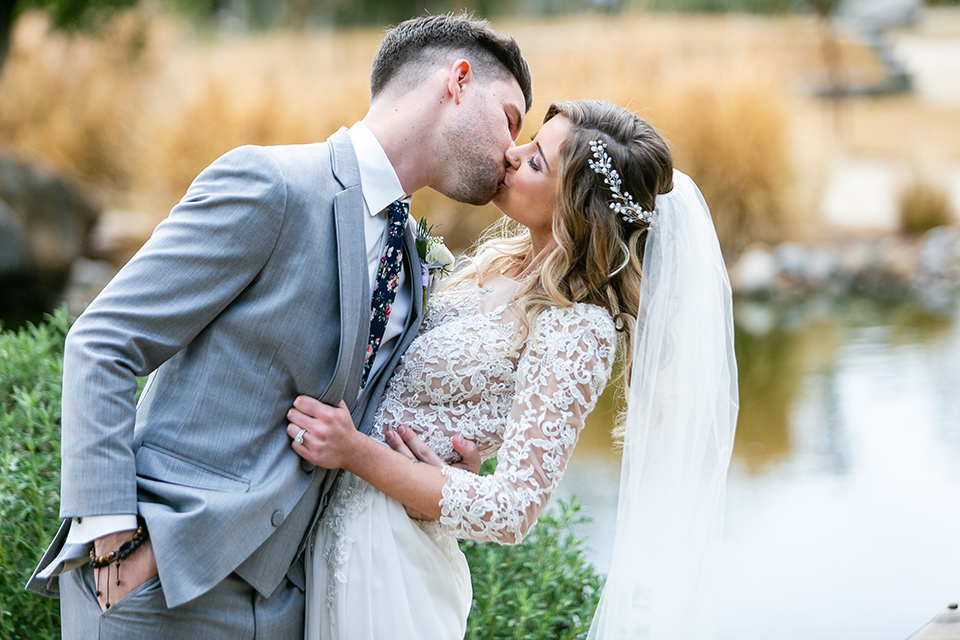  garden California floral wedding – couple kiss 
