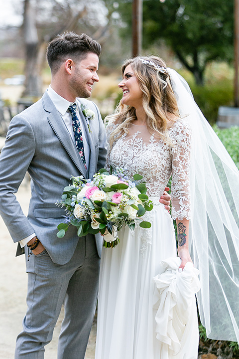  blue and red rustic garden wedding – bride and groom walking