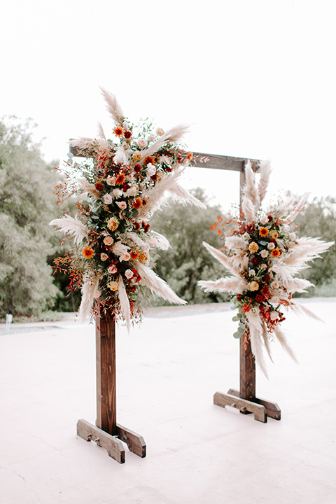  bohemian orange wedding – ceremony arch 