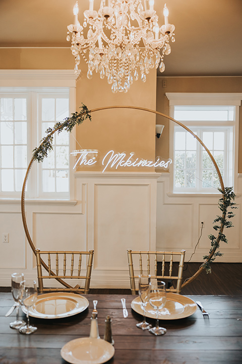  A dreamy amber toned wedding in Arizona at a wedgewood wedding venue – with the bride in a long sleeve lace gown and the bridesmaids in burnt orange dresses and the groom in a café brown suit and the groomsmen in a tan suit – seating chart