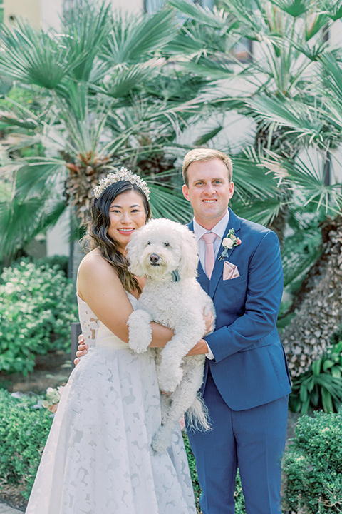  fun garden wedding with a traditional tea ceremony – couple with their dogs 