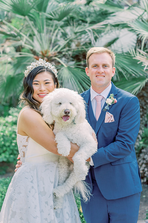  fun garden wedding with a traditional tea ceremony – couple with their dogs