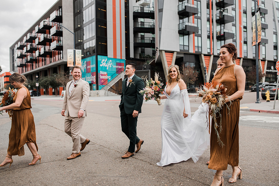 fall navy, green, and orange wedding – bridal party walking