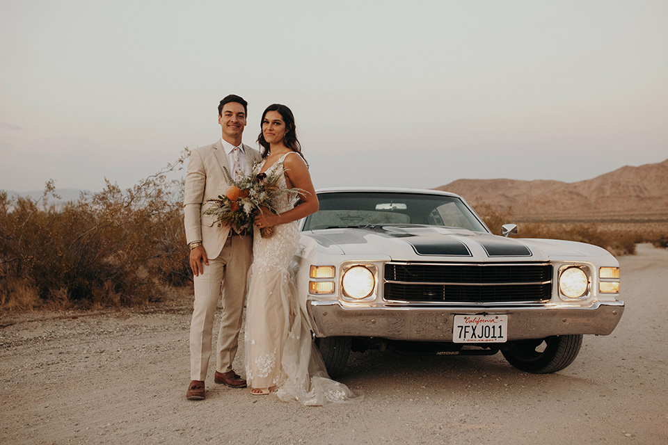  boho adventure elopement in Joshua tree, CA – by the car 