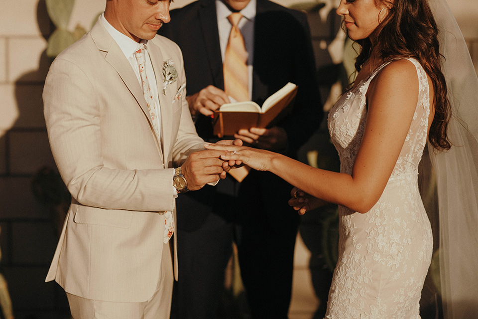  boho adventure elopement in Joshua tree, CA – exchanging rings 