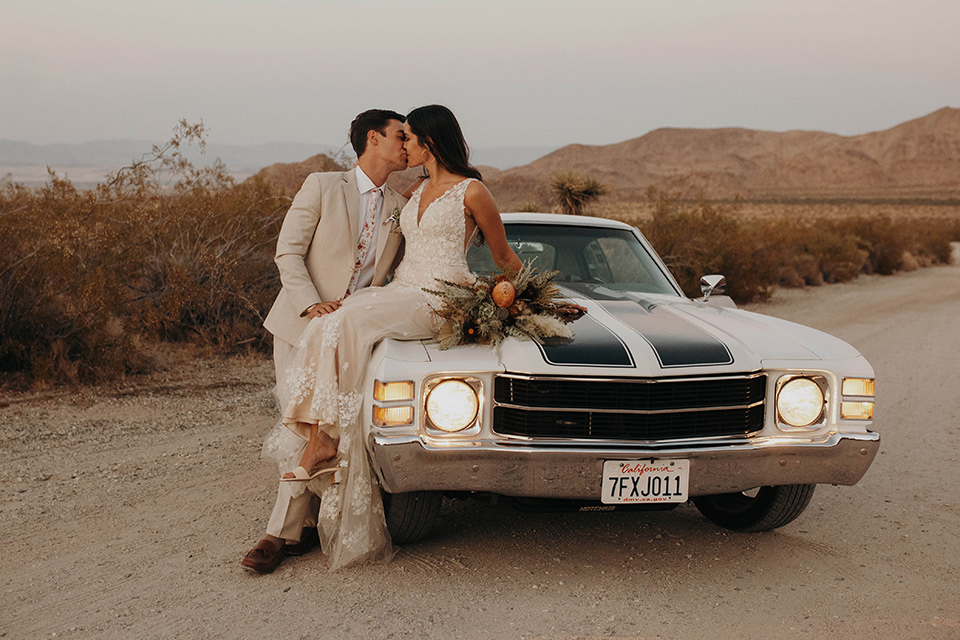  boho adventure elopement in Joshua tree, CA – on the car