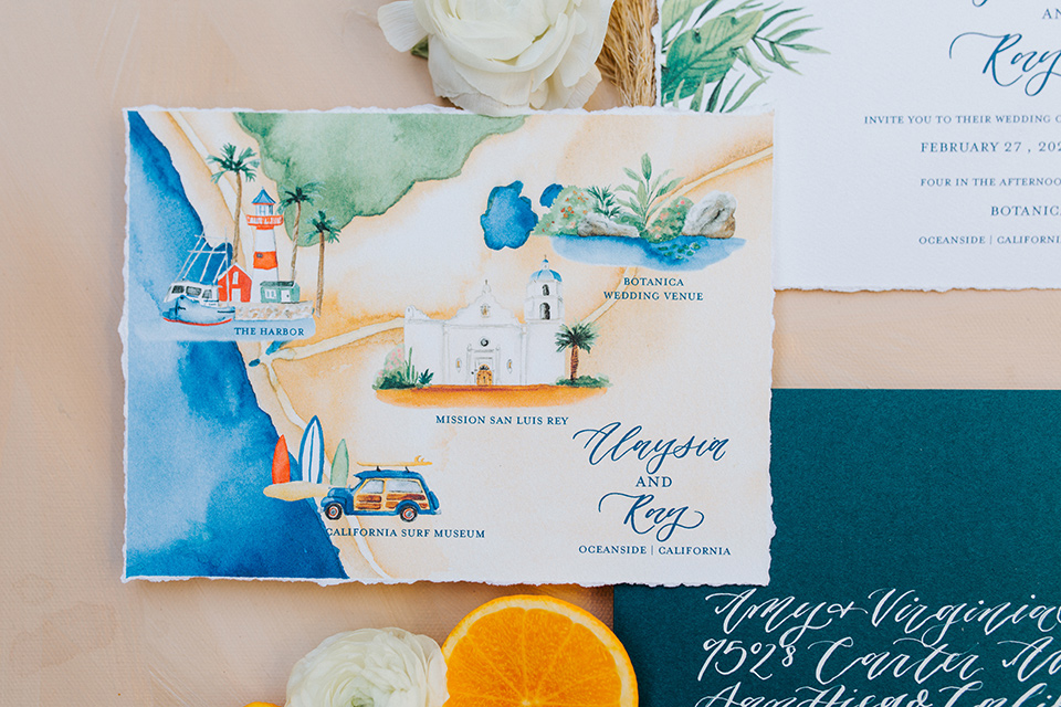  bohemian wedding with the bride in a flowing lace gown and the groom in a caramel brown suit with a green velvet bow tie- hand painted invitations