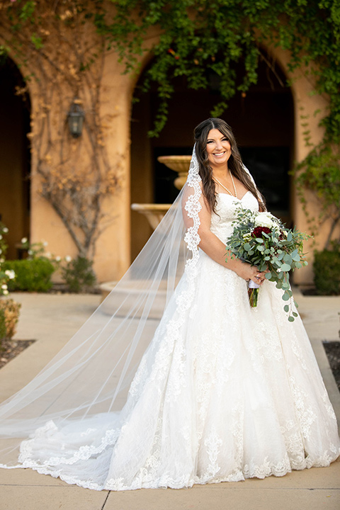  Iridescent dreams in the desert with the bride in a pink dress and the groom in a rose suit - bride