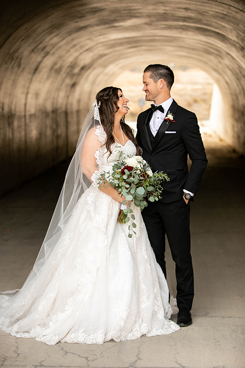  Iridescent dreams in the desert with the bride in a pink dress and the groom in a rose suit - bride