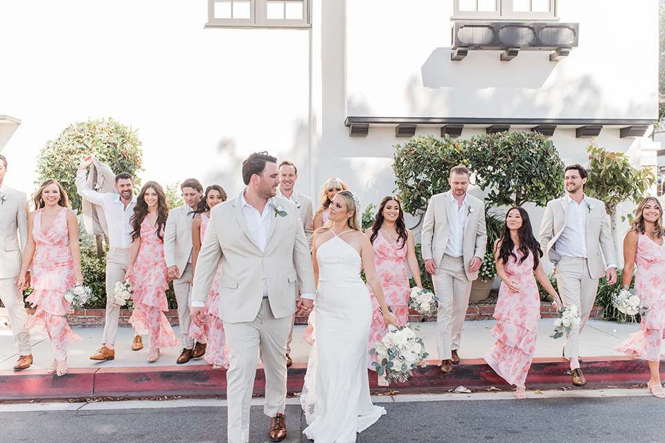  tan and pink garden wedding with floral bridesmaid dresses and the groom and groomsmen in tan suits - bridalparty 