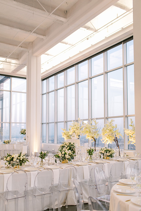  A city wedding with the guys in burgundy and black tuxedos and the bridesmaids in blush dresses- reception décor