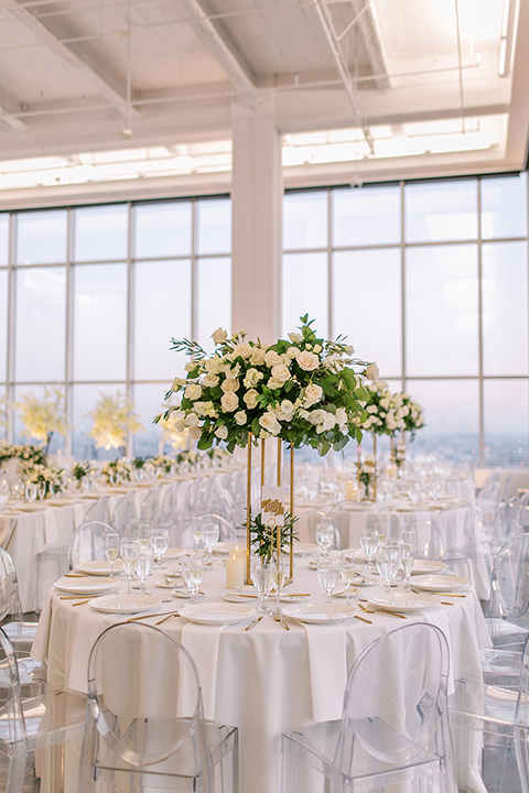  A city wedding with the guys in burgundy and black tuxedos and the bridesmaids in blush dresses- reception décor 