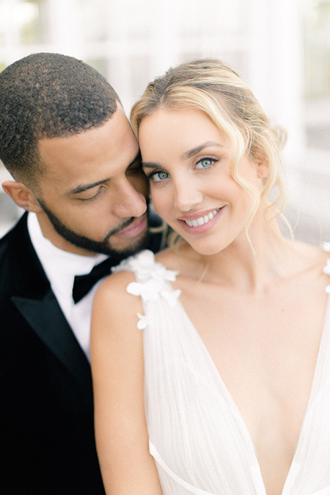  caramel mountain wedding with  black tie flare and the groom in a black velvet tuxedo – couple smiling 