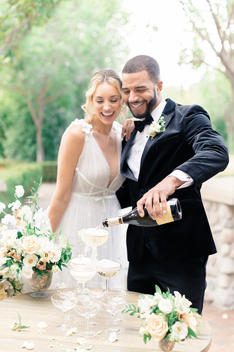  caramel mountain wedding with  black tie flare and the groom in a black velvet tuxedo – ceremony decor 