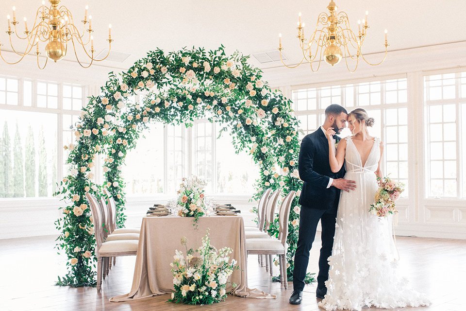  caramel mountain wedding with  black tie flare and the groom in a black velvet tuxedo – couple at reception