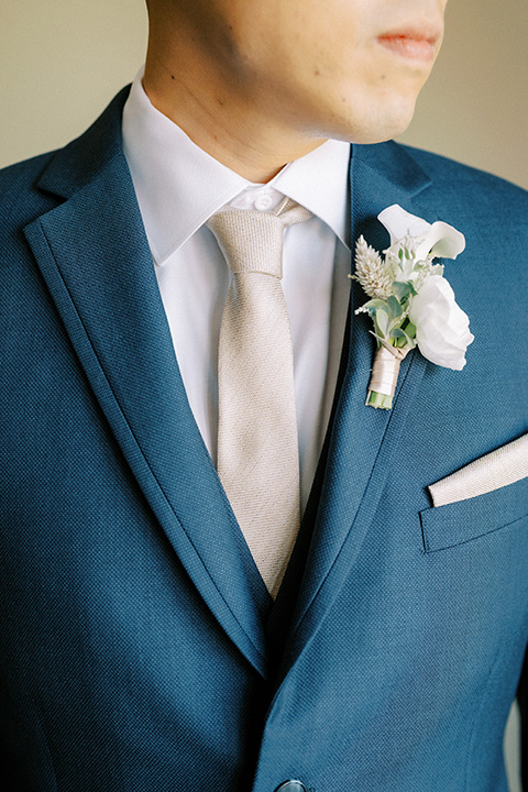  navy and white garden wedding with the groom in a navy suit and the bride in a white ballgown – groom 