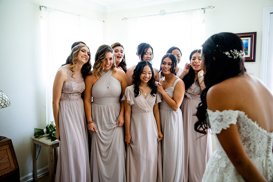  classic wedding on Catalina with the groom and groomsmen in black tuxedos and the bridesmaids in blush gowns