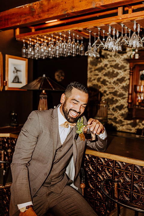  rustic bohemian wedding with brown and gold color scheme – groom 