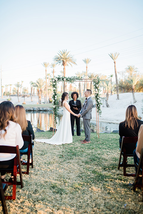  bali inspired wedding with the groom in a fun green and brown mix and match look 