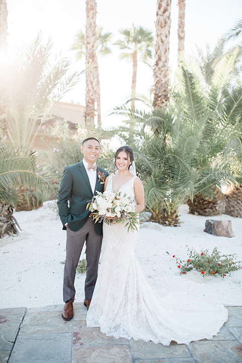  bali inspired wedding with the groom in a fun green and brown mix and match look 