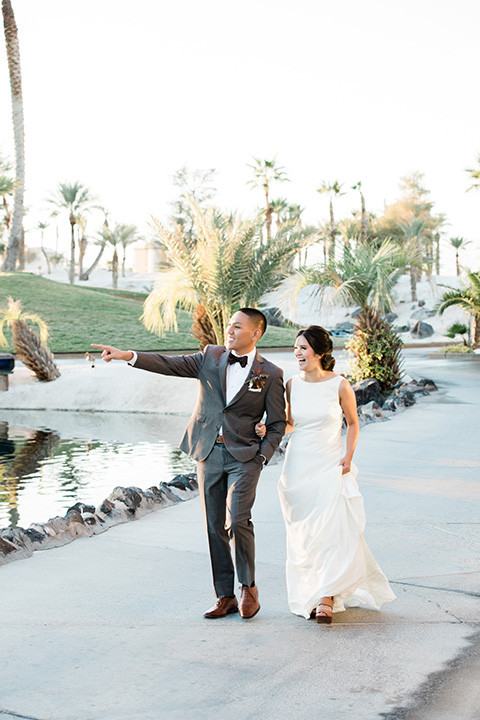  bali inspired wedding with the groom in a fun green and brown mix and match look 