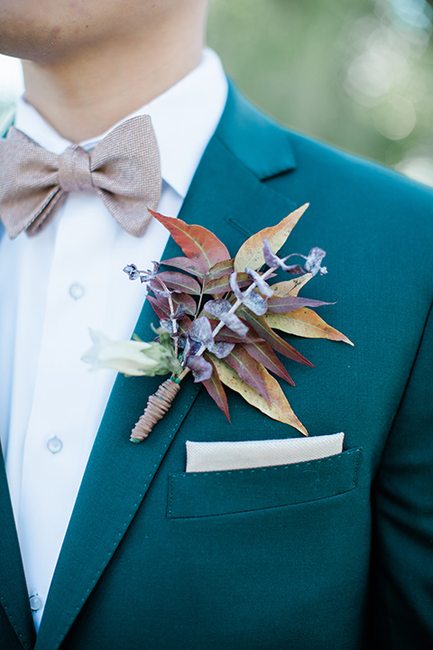  bali inspired wedding with the groom in a fun green and brown mix and match look 