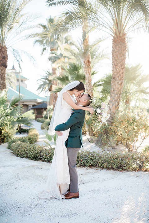  bali inspired wedding with the groom in a fun green and brown mix and match look 