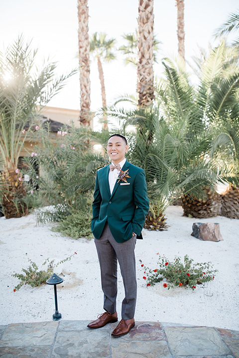  bali inspired wedding with the groom in a fun green and brown mix and match look 