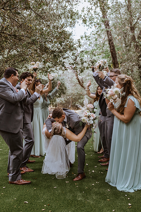  rustic wedding with café brown suits and mint bridesmaids dresses 