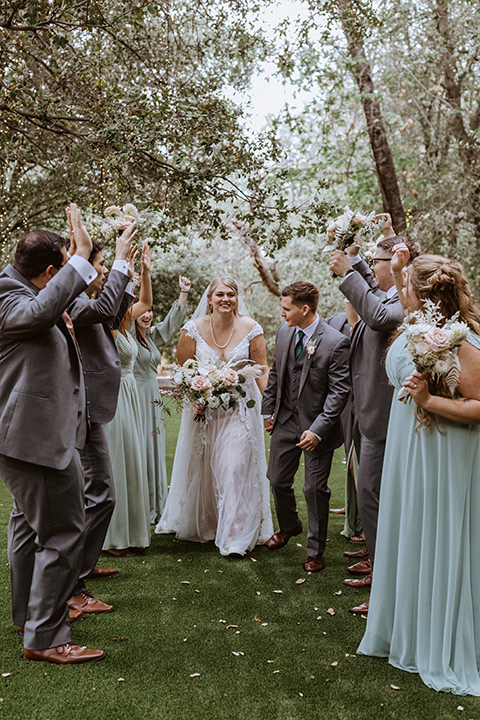  rustic wedding with café brown suits and mint bridesmaids dresses 