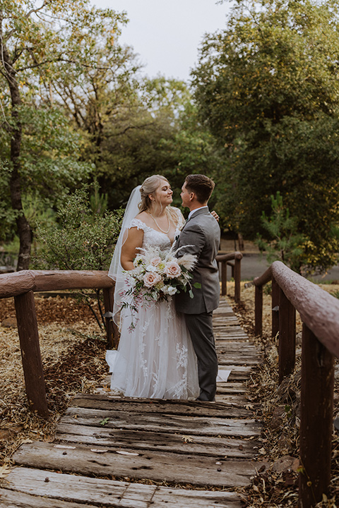  rustic wedding with café brown suits and mint bridesmaids dresses 