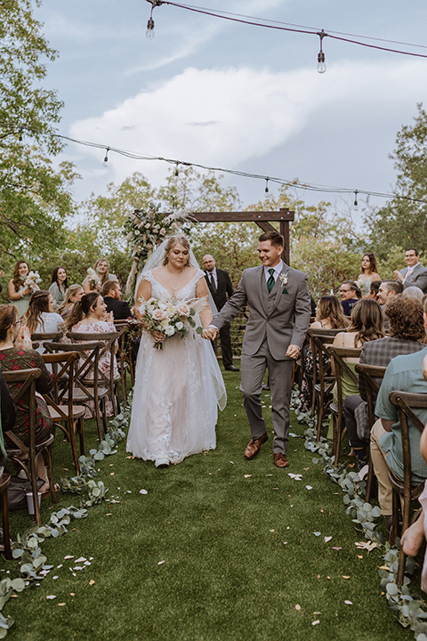  rustic wedding with café brown suits and mint bridesmaids dresses 