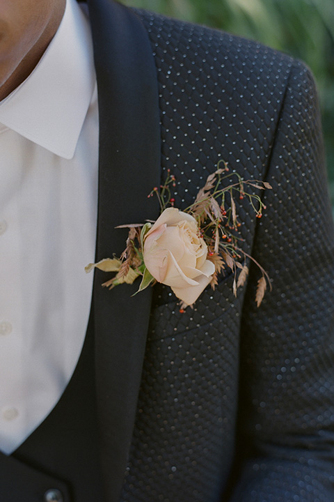  romantic wedding at colony 29 with the bride in a tulle ballgown with sleeves and the groom in a diamond black tuxedo – groom   