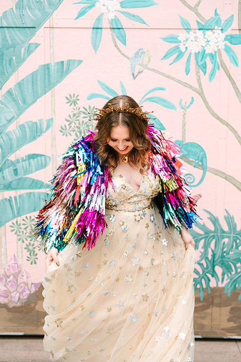  a colorful disco wedding in dtla with the bride in a champagne gown with metallic stars and the groom in a cobalt blue suit – bride and her bridesmaids 