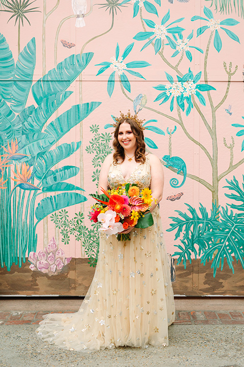  a colorful disco wedding in dtla with the bride in a champagne gown with metallic stars and the groom in a cobalt blue suit – bridesmaids 