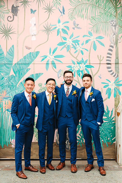  a colorful disco wedding in dtla with the bride in a champagne gown with metallic stars and the groom in a cobalt blue suit – groomsmen 