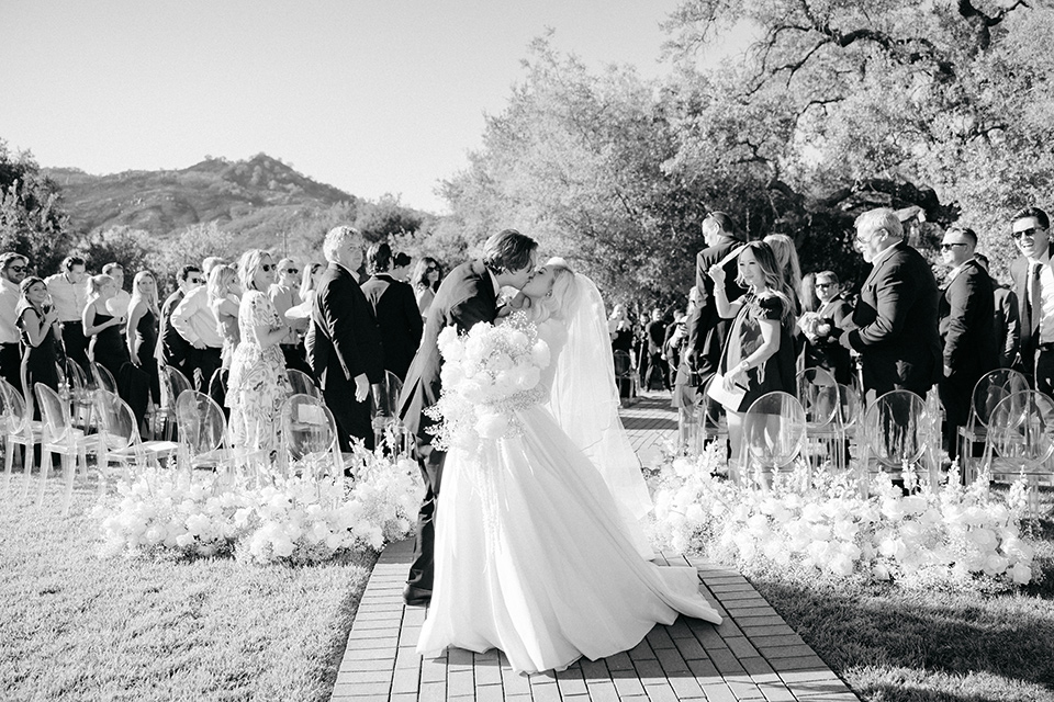  black and white wedding design with luxe details – walking down the aisle