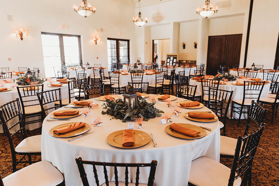  a fall toned wedding at the Fallbrook Estate Wedgewood venue with the groom and groomsmen in grey suits and the bridesmaids in orange – reception tables 