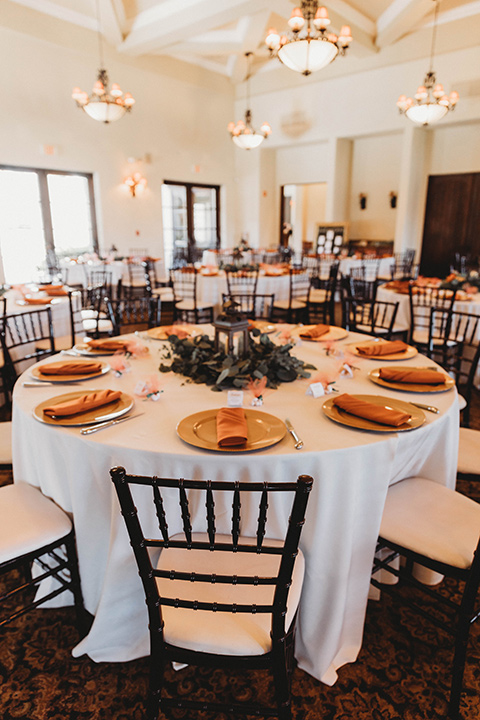  a fall toned wedding at the Fallbrook Estate Wedgewood venue with the groom and groomsmen in grey suits and the bridesmaids in orange – table and décor
