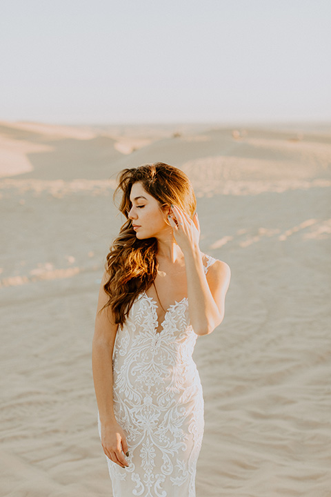  glamis sand dunes wedding with the groom in a tan and a gold velvet tuxedo at sunset - bride 
