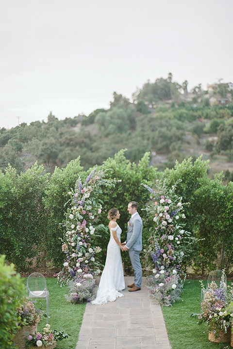  hilltop garden wedding with springtime details – couple at ceremony
