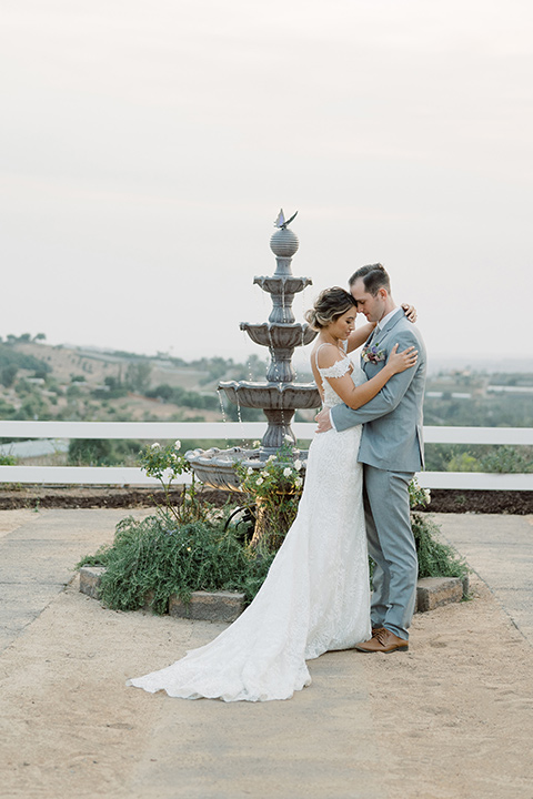  hilltop garden wedding with springtime details – couple dancing